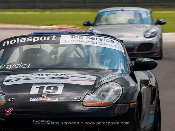 Two Porsches Enter the Straight